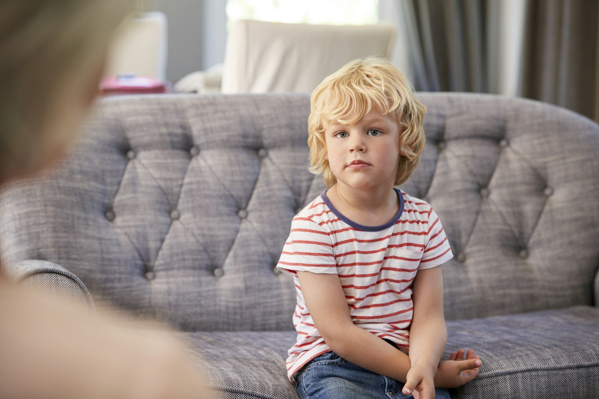 Young boy having therapy with a child psychologist